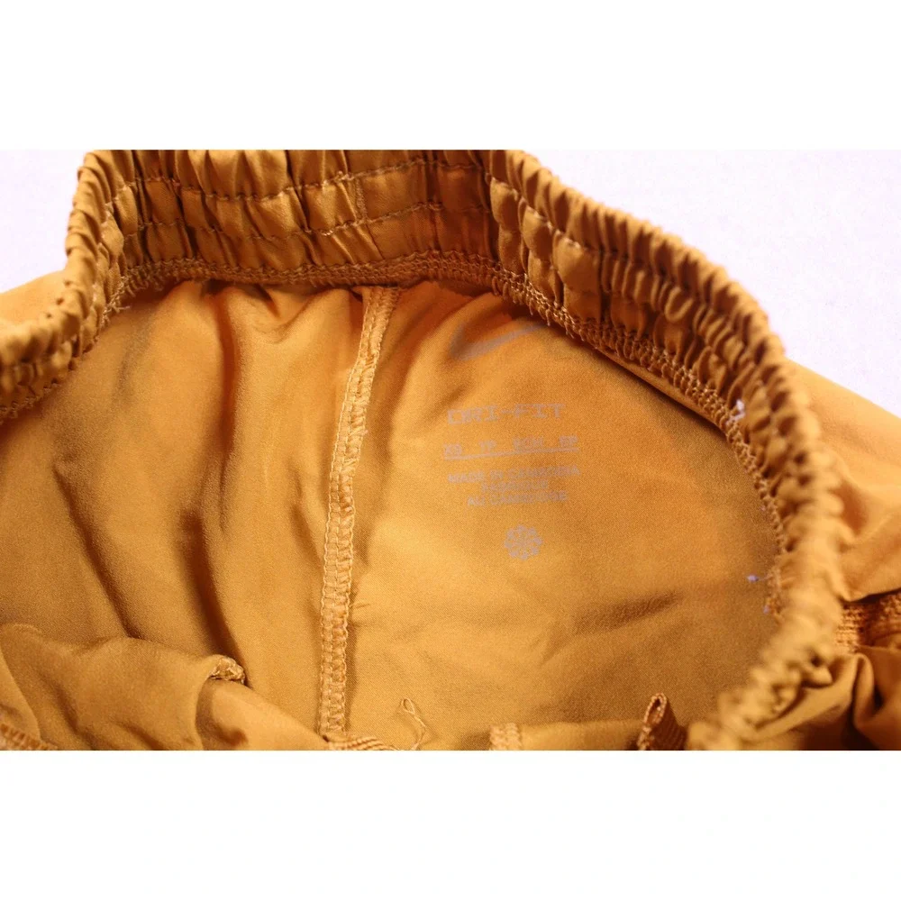 Nike Kids Athletic Shorts Mustard Yellow Gold Mesh Trim Elastic Waistband